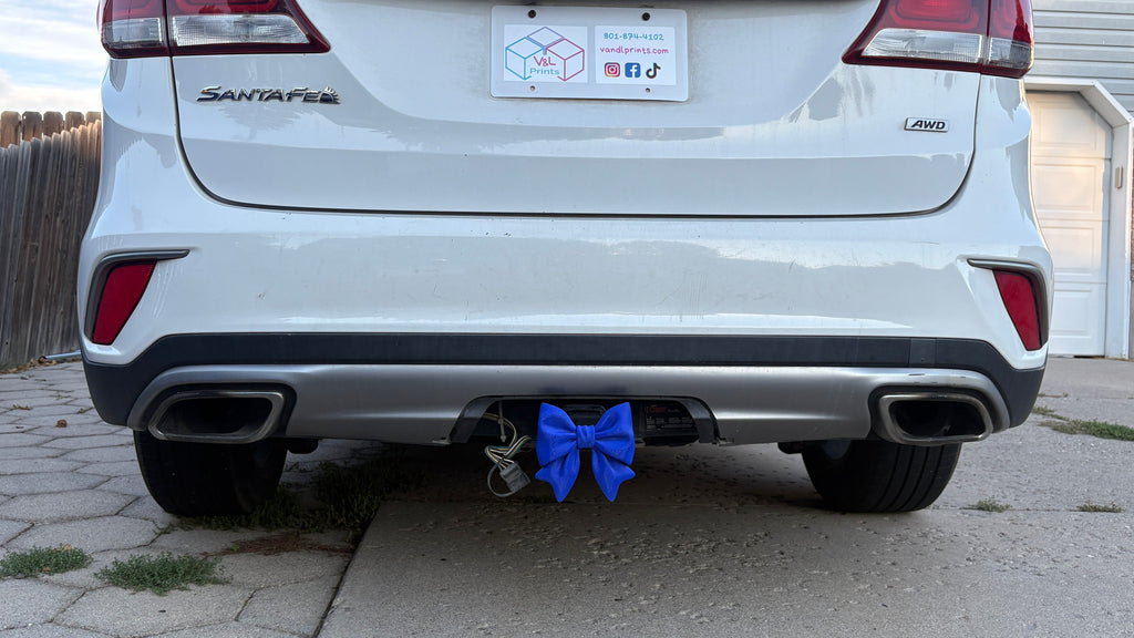 Blue bow hitch insert on a vehicle 